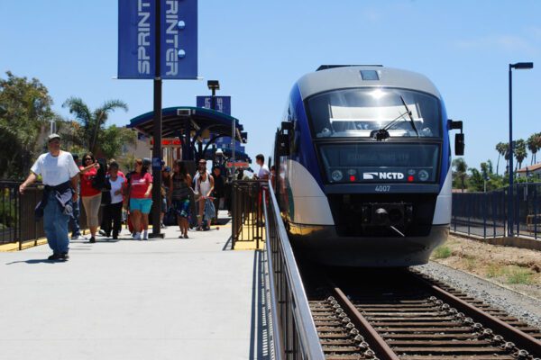 Sprinter is loading passengers at the Oceanside station.