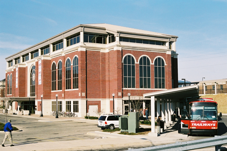 A Burlington Trailways bus is loading passengers at the Champaign, IL railroad station.