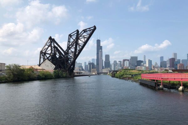 A view of the Chicago Skyline from the 18th st bridge. The Willis Tower is in the the background and the St. Charles Airline bridge is in the foreground.