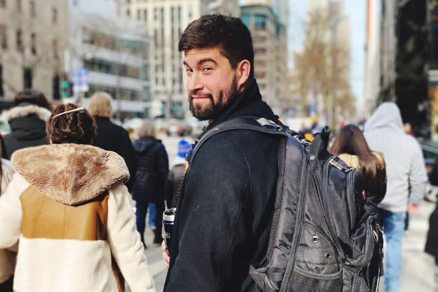 900x600 Man With A Backpack In The City