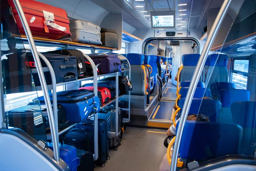 900x600 Airport Train Interior Luggage