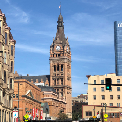 A picture of Milwaukee City Hall looking across the river.