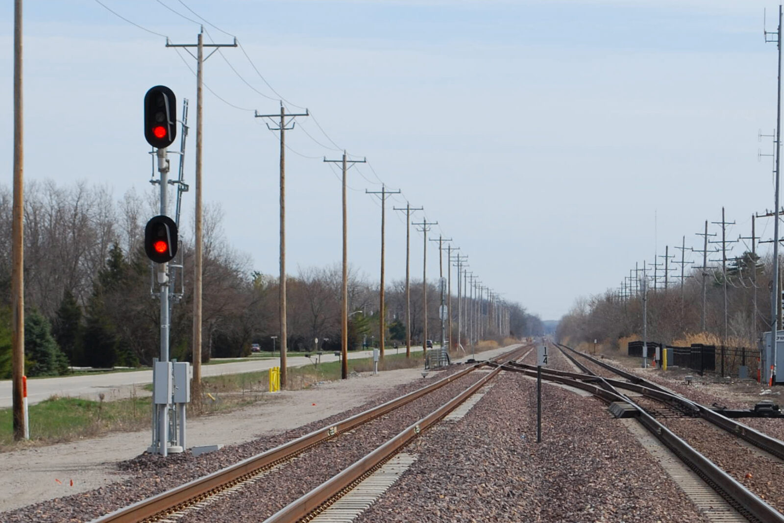 a signal alongside the tracks on the Chicago - St. Louis Corridor.