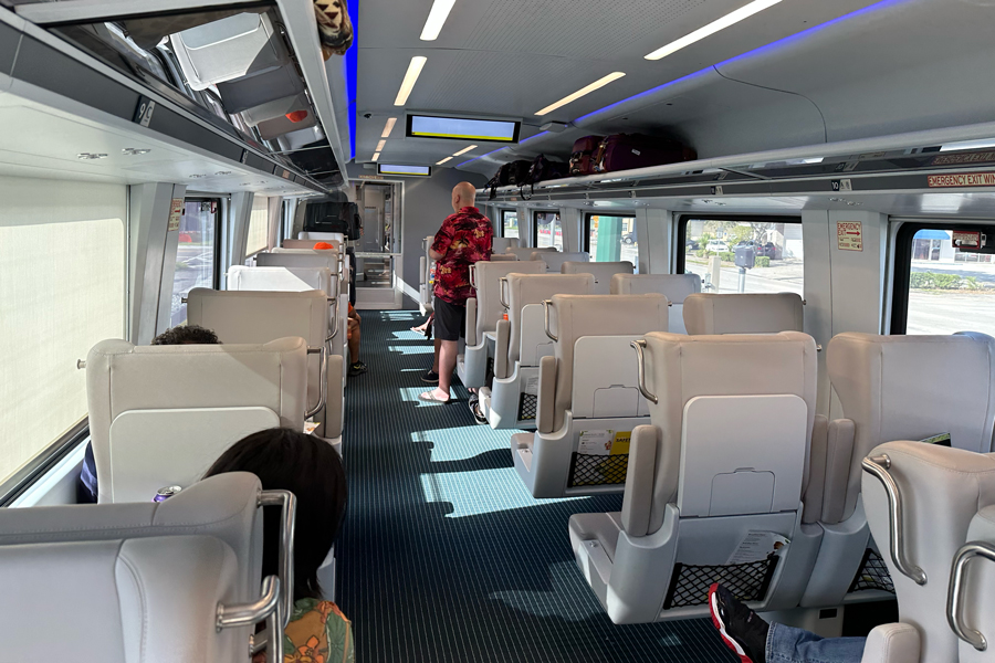The interior of a Brightline first-class car.