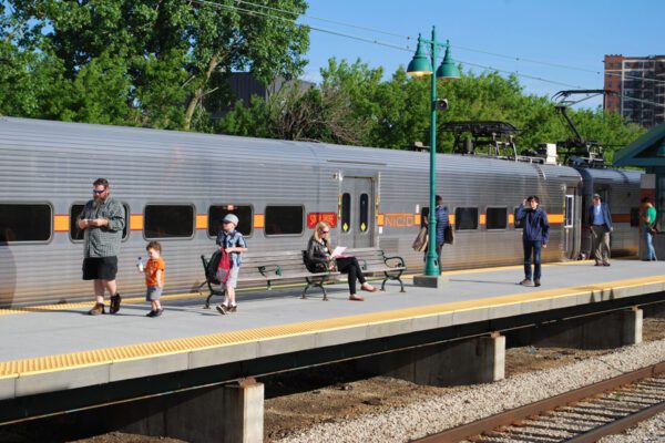 A northbound South Shore train has just closed its doors after a station stop in Hyde Park.