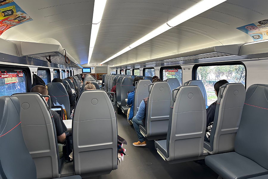 The interior of a new Caltrain train.
