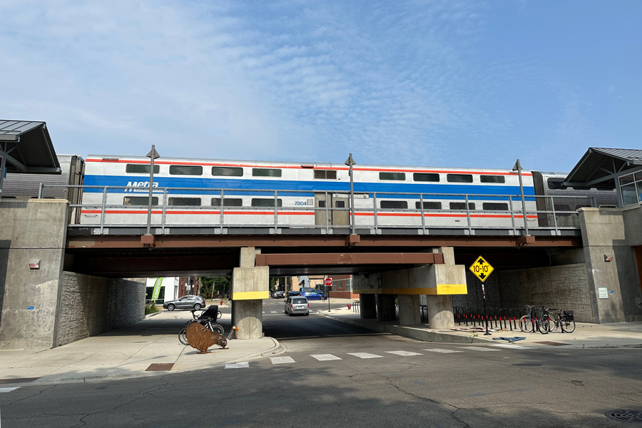 A Metra train crossing the new bridge over Leland Ave in the north side of Chicago.