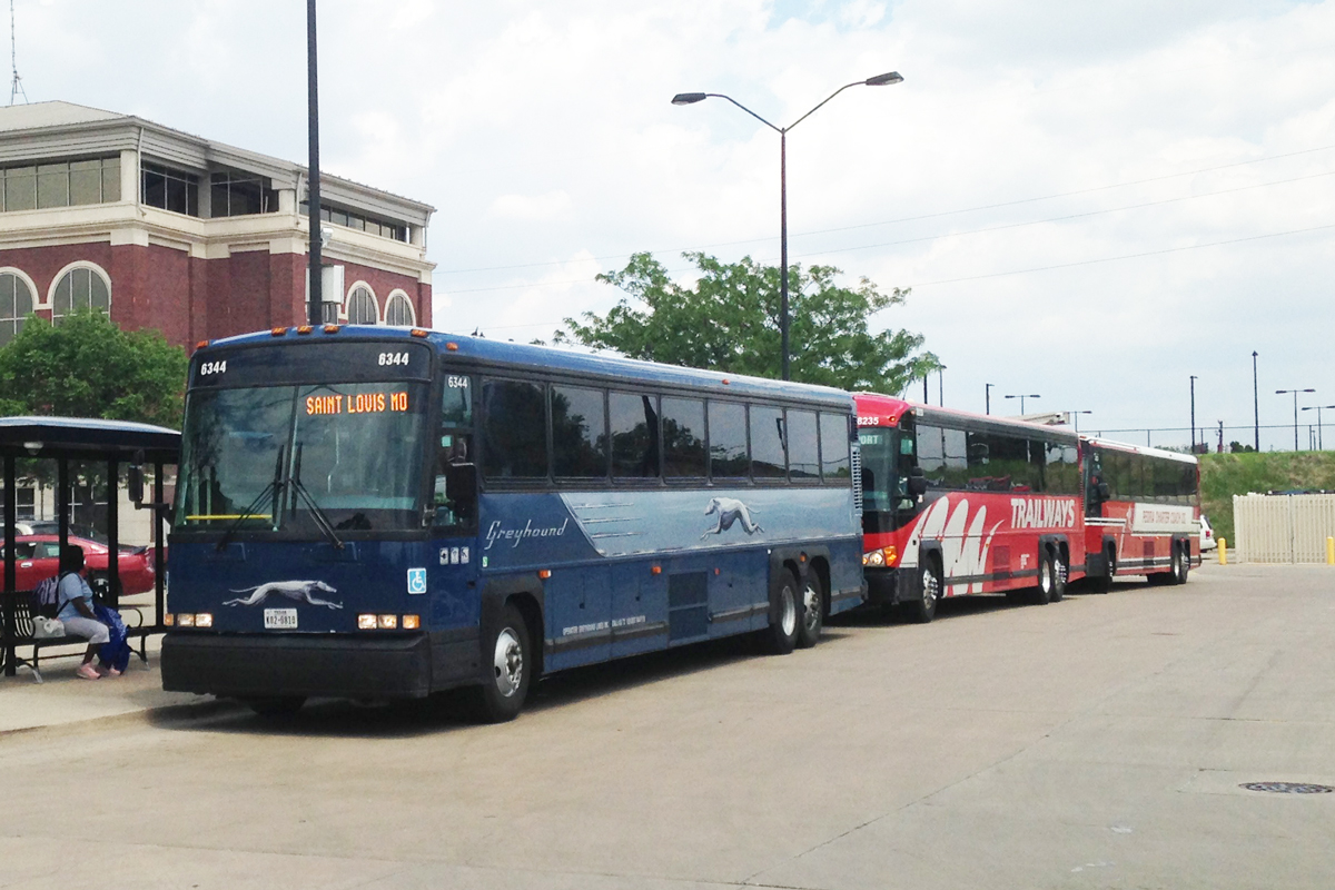 Champaign_GreyHound_etc_Harnish_IMG_1495_1200x800 Greyhound, Burlington Trailways. and Peoria Motorcoach buses are stopped at the Champaign, IL railway station.