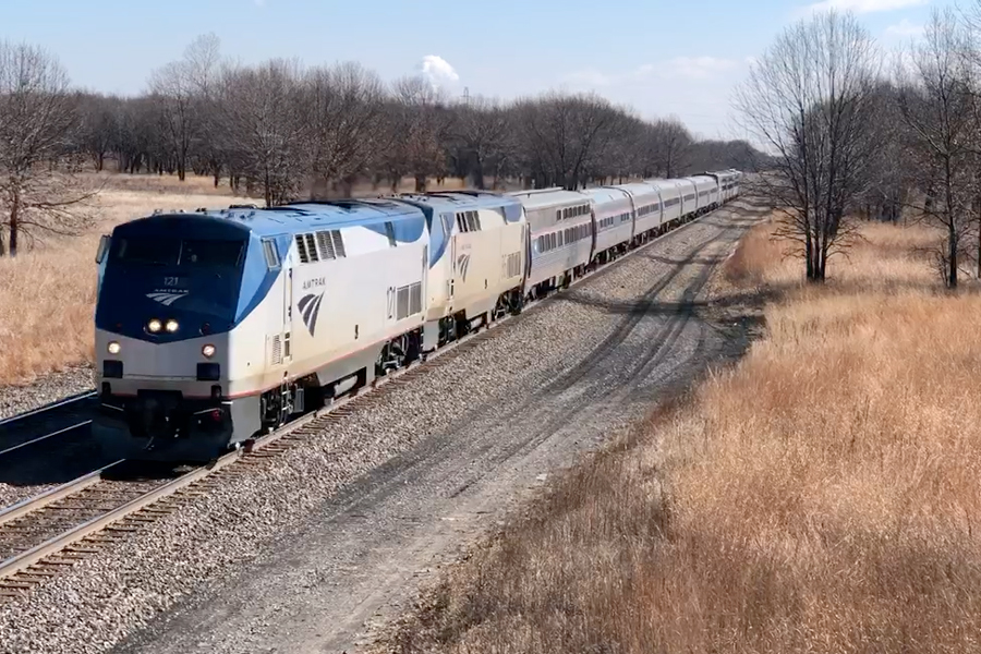 The Lake Shore Limited is passing by with Amfleet coaches built before 1984.