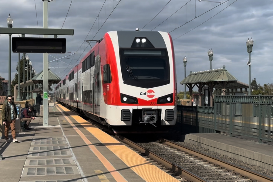 A Caltrain train is pulling into San Mateo station.